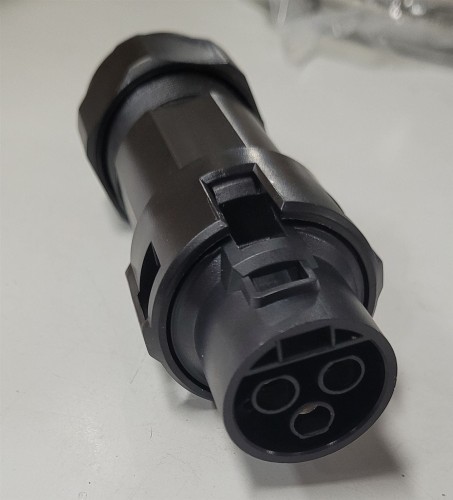Black plastic AC connector