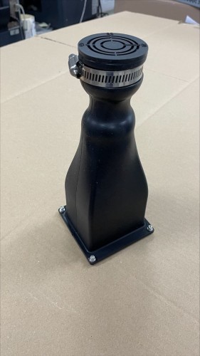 Black silicone oblong cover with screws in the base