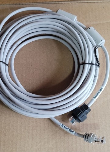 Gray communication cable made of plastic and colored metals